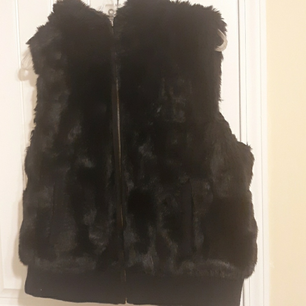 Imitation fur vest by loft with hood. Like new  an